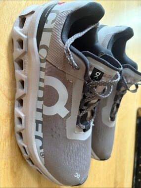 On Running Women’s Athletic Shoes in Taupe and Black